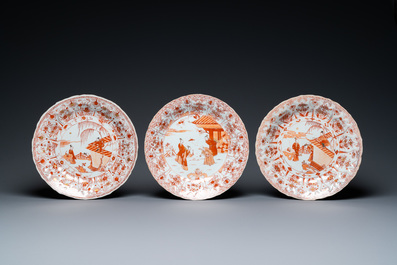 Three Chinese lotus-molded iron-red and gilt dishes, Kangxi