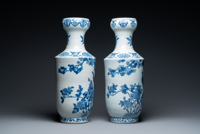 A pair of Chinese blue and white 'peacock' vases, Qianlong mark, 20th C.