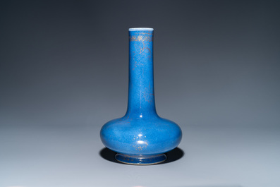 A Chinese gilt-decorated powder blue-ground bottle vase, Kangxi mark, 19th C.