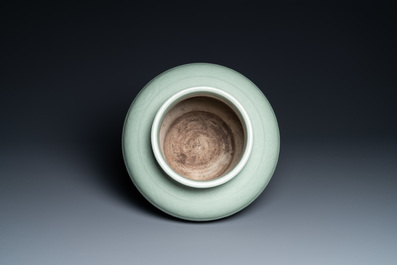 A Chinese monochrome celadon vase with underglaze floral design, Chenghua mark, Kangxi