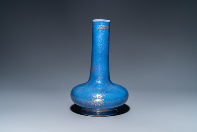 A Chinese gilt-decorated powder blue-ground bottle vase, Kangxi mark, 19th C.