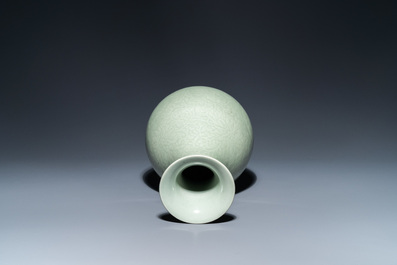 A Chinese monochrome celadon-glazed 'yuhuchunping' vase with underglaze floral design, Kangxi mark, 19th C.