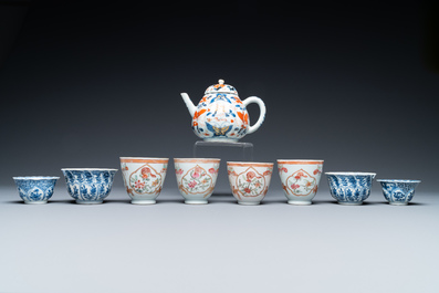 Eight Chinese blue and white and famille rose cups and saucers and an Imari-style teapot, Kangxi/Qianlong