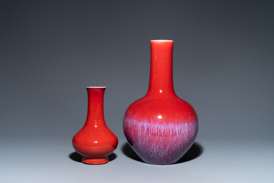 Two Chinese monochrome sang de boeuf-glazed bottle vases, 19th C.