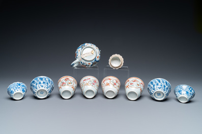 Eight Chinese blue and white and famille rose cups and saucers and an Imari-style teapot, Kangxi/Qianlong