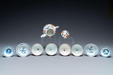 Eight Chinese blue and white and famille rose cups and saucers and an Imari-style teapot, Kangxi/Qianlong