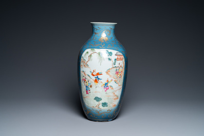 A Chinese famille rose gilt-decorated blue-ground vase, 18/19th C.