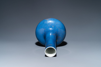 A Chinese gilt-decorated powder blue-ground bottle vase, Kangxi mark, 19th C.