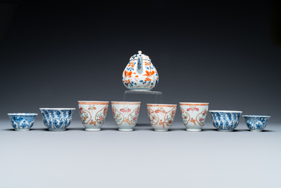 Eight Chinese blue and white and famille rose cups and saucers and an Imari-style teapot, Kangxi/Qianlong