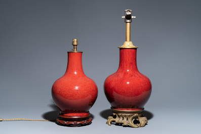 Two Chinese monochrome sang de boeuf-glazed bottle vases transformed into lamps, 19th C.