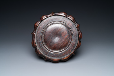 A Chinese enamelled celadon-glazed censer with a dragon on a lotus-shaped wooden stand, Qing