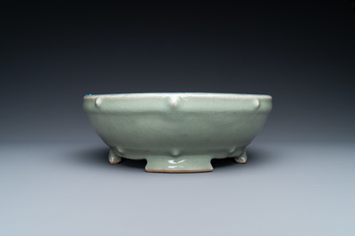 A Chinese enamelled celadon-glazed censer with a dragon on a lotus-shaped wooden stand, Qing