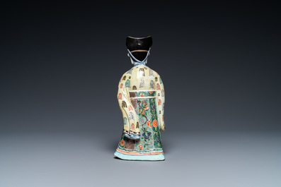 A Chinese famille verte figure on wooden stand, Kangxi