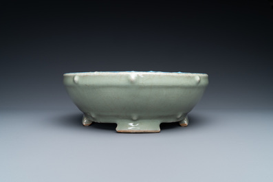A Chinese enamelled celadon-glazed censer with a dragon on a lotus-shaped wooden stand, Qing