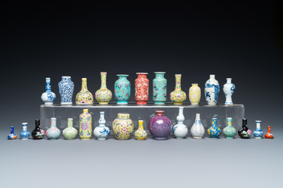 Twenty-eight Chinese blue and white and famille rose minature vases, Kangxi and later
