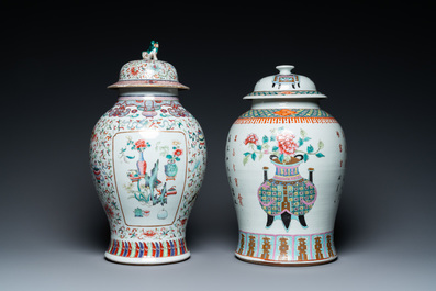 Two Chinese famille rose vases and covers, 19th C.