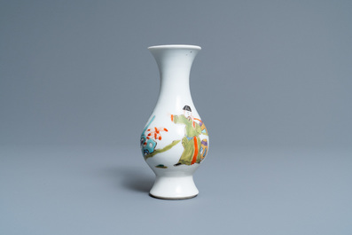 A Chinese famille rose vase with a man and a woman in a garden, Yongzheng