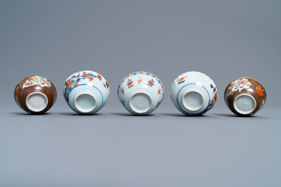 A Chinese Imari-style porringer, a mug, a bowl and five cups and saucers, Kangxi/Qianlong