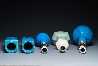 Four Chinese monochrome turquoise vases and a celadon vase, 19/20th C.