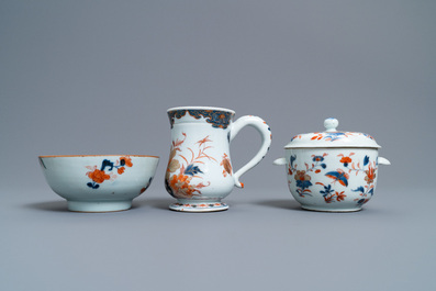 A Chinese Imari-style porringer, a mug, a bowl and five cups and saucers, Kangxi/Qianlong