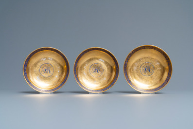 Six rare Chinese monogrammed gilt-ground cups and saucers, Yongzheng/Qianlong