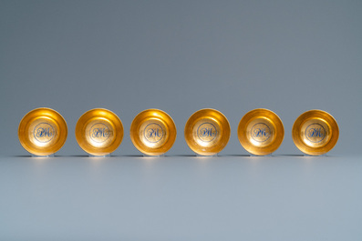 Six rare Chinese monogrammed gilt-ground cups and saucers, Yongzheng/Qianlong