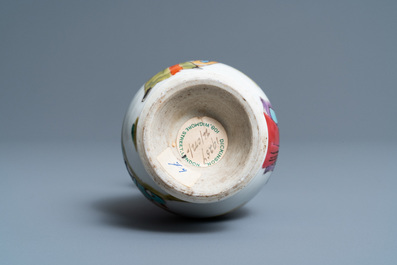 A Chinese famille rose vase with a man and a woman in a garden, Yongzheng