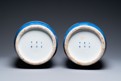A pair of Chinese famille verte powder-blue ground vases, Kangxi mark, 19th C.