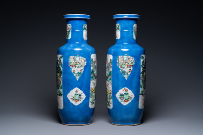 A pair of Chinese famille verte powder-blue ground vases, Kangxi mark, 19th C.