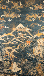 A large Japanese silk embroidery with Mount Fuji, cranes and carps, Meiji, 19th C.