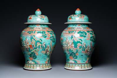A pair of large Chinese turquoise-ground famille verte vases and covers, 19th C.