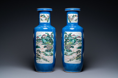 A pair of Chinese famille verte powder-blue ground vases, Kangxi mark, 19th C.