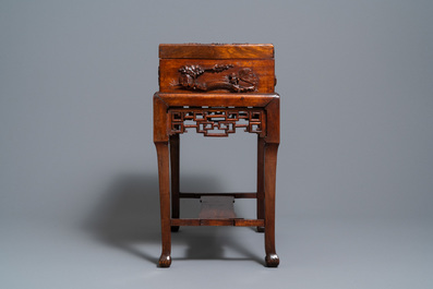 A Chinese wooden casket on stand, 19/20th C.