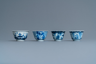 Twenty-one Chinese blue and white saucers and eighteen cups, Kangxi