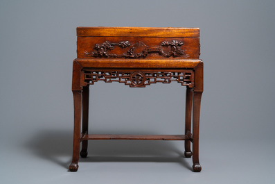 A Chinese wooden casket on stand, 19/20th C.