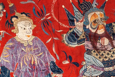 A Chinese red-ground felt cloth with silk embroidery of figures, 19th C.