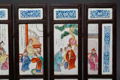 A Chinese five-fold wooden screen with famille rose plaques, 19th C.