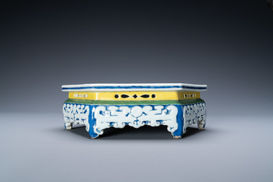 A Chinese famille rose hexagonal 'antiquities' stand, Yongzheng