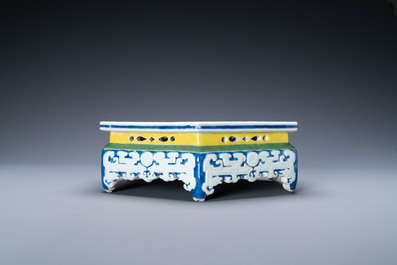 A Chinese famille rose hexagonal 'antiquities' stand, Yongzheng