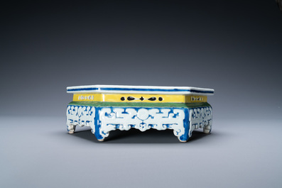 A Chinese famille rose hexagonal 'antiquities' stand, Yongzheng