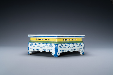 A Chinese famille rose hexagonal 'antiquities' stand, Yongzheng
