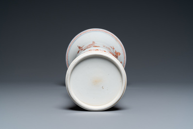 Un vase de forme 'gu' en porcelaine de Chine en rouge de fer et dor&eacute;, Kangxi