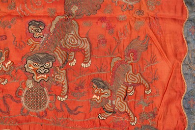 A Chinese gold thread-embroidered silk 'Buddhist lions' panel, 19th C.