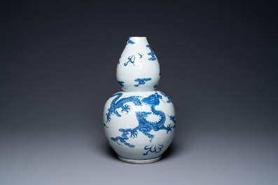 A Chinese blue and white double gourd 'dragons' vase, Qianlong
