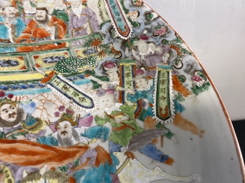 A large Chinese Canton famille rose 'horseriders' dish, 19th C.