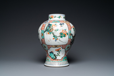 A Chinese famille verte vase with birds near flowery branches, Kangxi