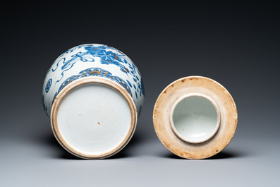 A Chinese gilt-heightened blue and white vase and cover, Kangxi/Yongzheng