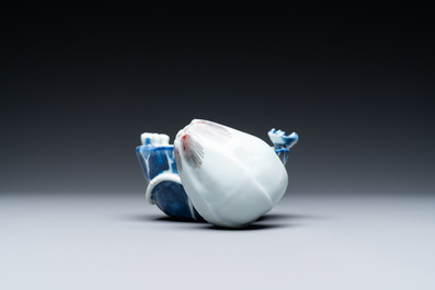 A Chinese blue, white and copper-red 'crab in lotus' water dropper, Kangxi
