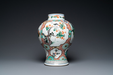 A Chinese famille verte vase with birds near flowery branches, Kangxi