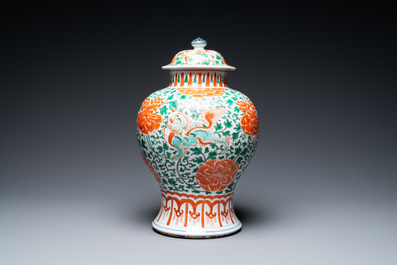 A Chinese famille verte 'Buddhist lions' vase and cover, Kangxi